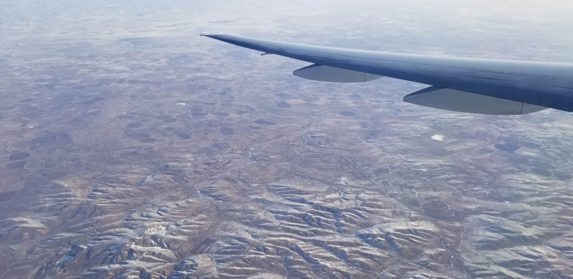 Boeing 777 window view over China